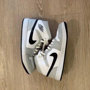 Nike Jordan’s White, Black, and Gray Sneakers